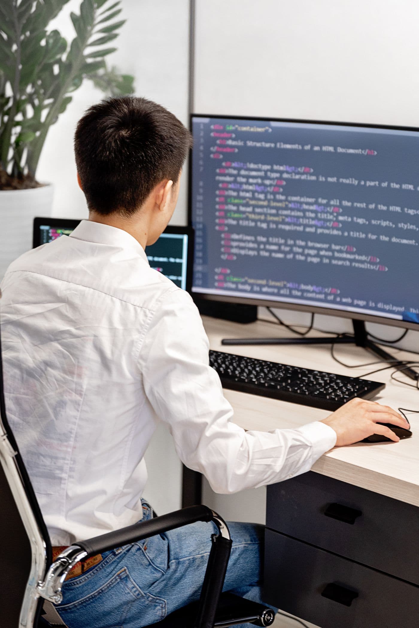A developer working at a desk